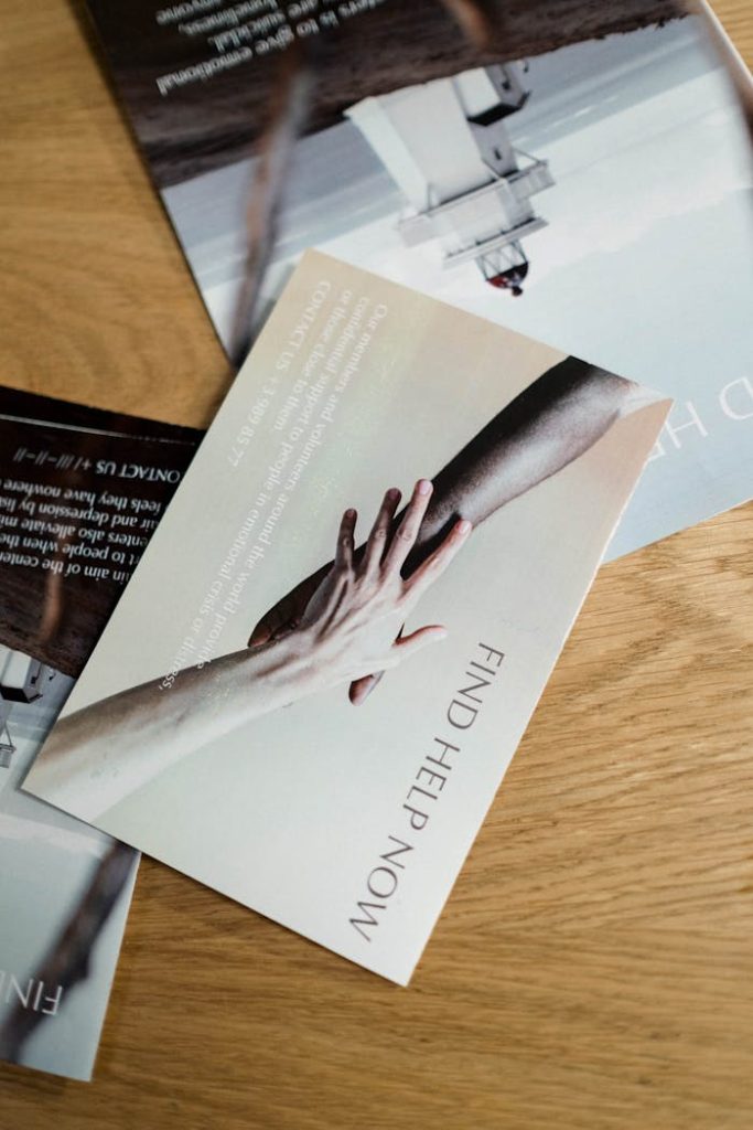Home Brochures On A Wooden Table 8526705 683x1024