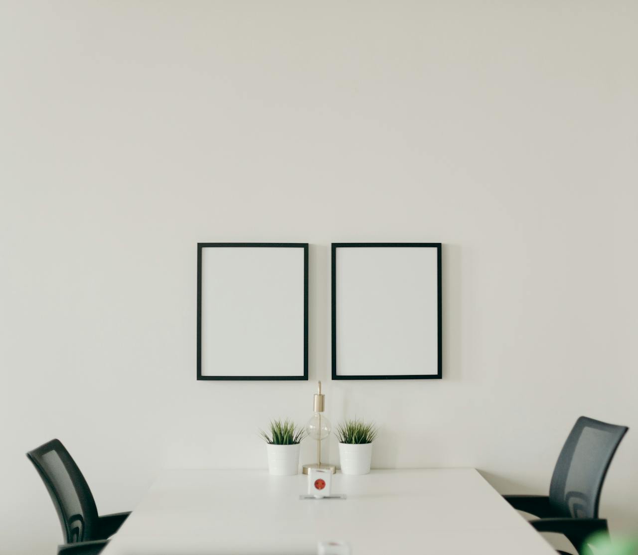 Home White Wooden Table With Chairs In A Room 4064835